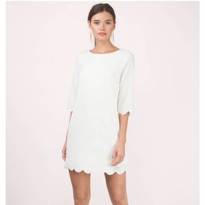 Tobi cream scalloped shift dress. Size XS